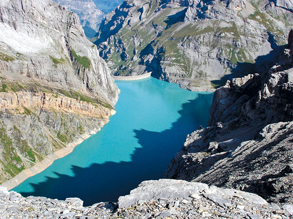 Wasserkraft als erneuerbare Energiequelle – der Stausee Limmernboden in der Schweiz / Pressebild:
