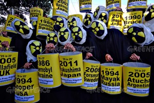 Greenpeace marked the 25th anniversary of the Chernobyl nuclear disaster on April 26, 2011, with a call for the Philippines to strike out nuclear from all government energy plans. Activists in black cloaks and radioactivity masks held a grim procession to deliver the demand letter at the Department of Energy.  They carried paper lanterns enumerating the world's 25 worst nuclear disasters of the last 25 years, from Chernobyl, which up to now is still experiencing widespread contamination especially in their food supplies, to Fukushima, where a similar story is now developing. © Veejay Villafranca / Greenpeace