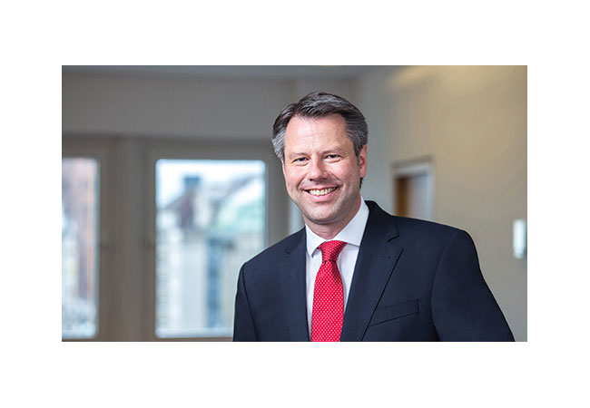 Pressebild: Portraitfoto des Transaktionsleiters Dr. Marcus Bechtel