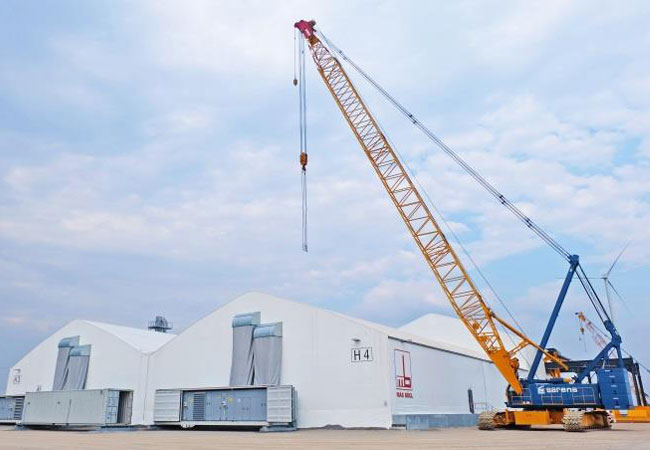 PB: Deutsche Werksqualität in Fernost: die Mobile Fertigung der Max Bögl Wind AG. Bildquelle: Max Bögl Wind AG/Reinhard Mederer