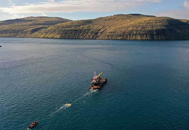 PB: Minesto's tidal energy converter DG100 being towed out to the Vestmannasund site, Faroe Islands / Photographer: Minesto