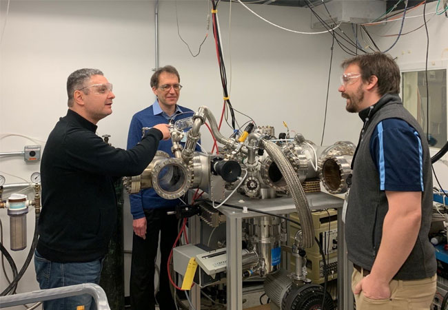 PB: Caption: The RADMASS team will have access to state-of-the-art materials characterization and X-ray imaging equipment on GE’s Research campus in Niskayuna, NY to develop its new inspection technique in support of fuel recycling. Pictured (from left to right): Bogdan Neculaes, Principal Scientist, and Uwe Wiedmann, Senior Scientist, who specialize in radiation physics and system design; and the project’s PI, Andrew Hoffman, a materials scientist.