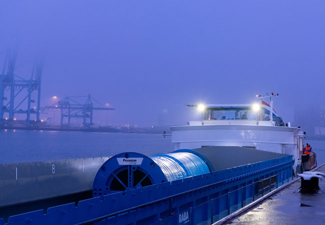 PB: Rhenus Project Logistics verschifft Kabeltrommeln für den Bau der SuedOstLink-Windstrom-Trasse