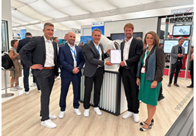 PB: ENERCON erhält Prüfbescheide für erste E-175 EP5 Prototypstandorte Übergabe der Dokumente durch TÜV SÜD bei der Messe Husum Wind