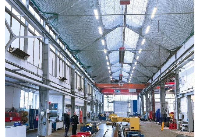 PB: 55 % Energieeinsparung – die energetische Sanierung mit hocheffizienter KÜBLER Infrarot-Heizungstechnologie bei Eickhoff am Produktionsstandort Bochum ist der dena eine Nominierung für den Energy Efficiency Award 2023 wert. / ©: KÜBLER Energiesparende Hallenheizungen