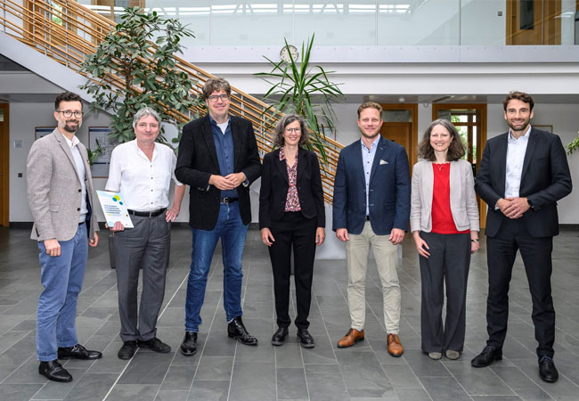 PB: Staatssekretär*in Kellner besucht gemeinsam mit Verbänden ENERTRAG-Hybridkraftwerk