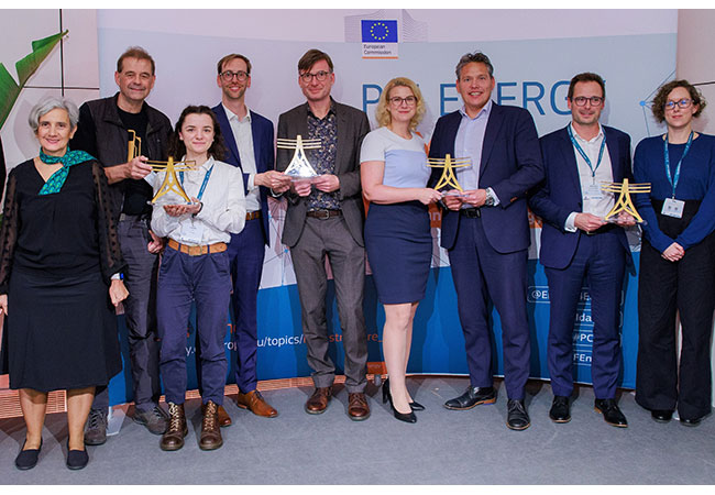 PB: Die Preisträger des RGI Grid Awards 2024. Gerald Kaendler, Leiter Asset Management und Moritz Mittelstaedt, Leiter Systemverhalten von Amprion (5. und 4. v.l.) /  ©: PCI Energy Days