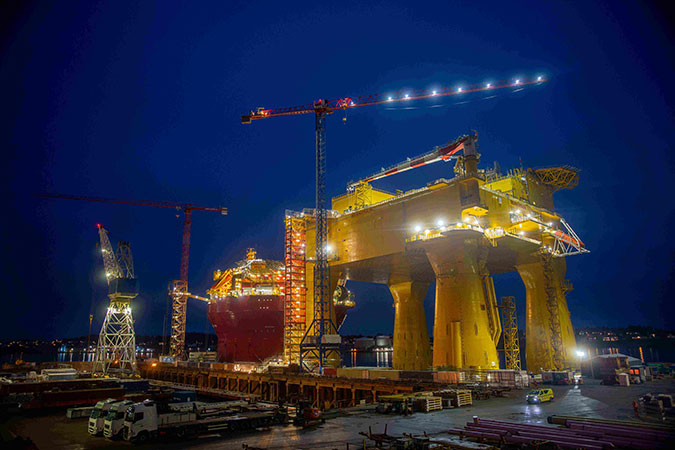 PB: The DolWin epsilon platform towers over the dock at Aibel’s yard in Haugesund.